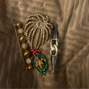 Gold and Crystal Firework Brooch with Green Enamel Leaf Accent